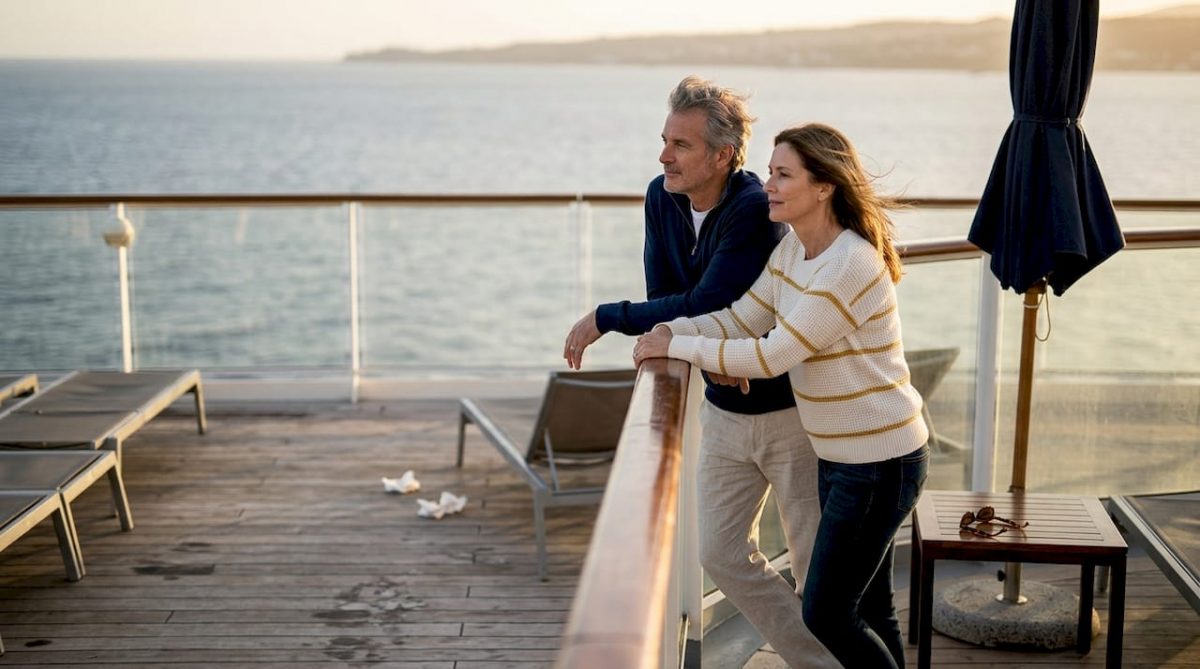 Couple enjoying view on luxury cruise deck